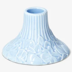 Blue candleholder with embossed hydrangeas