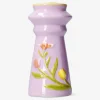 Candle holder with embossed flowers