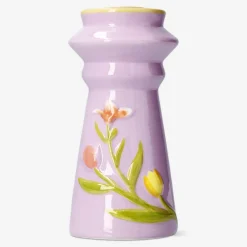 Candle holder with embossed flowers