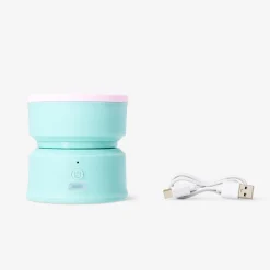 Cleaning machine for makeup brushes