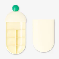Pill organiser with slide mechanism