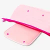 Pink organiser bag for hair styling tools