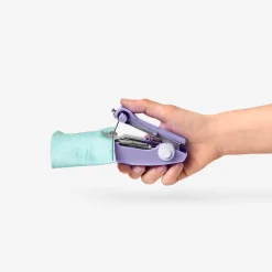 Purple handheld sewing machine