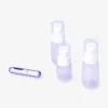 Purple travel set with perfume bottle