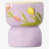 Tealight holder with embossed flowers