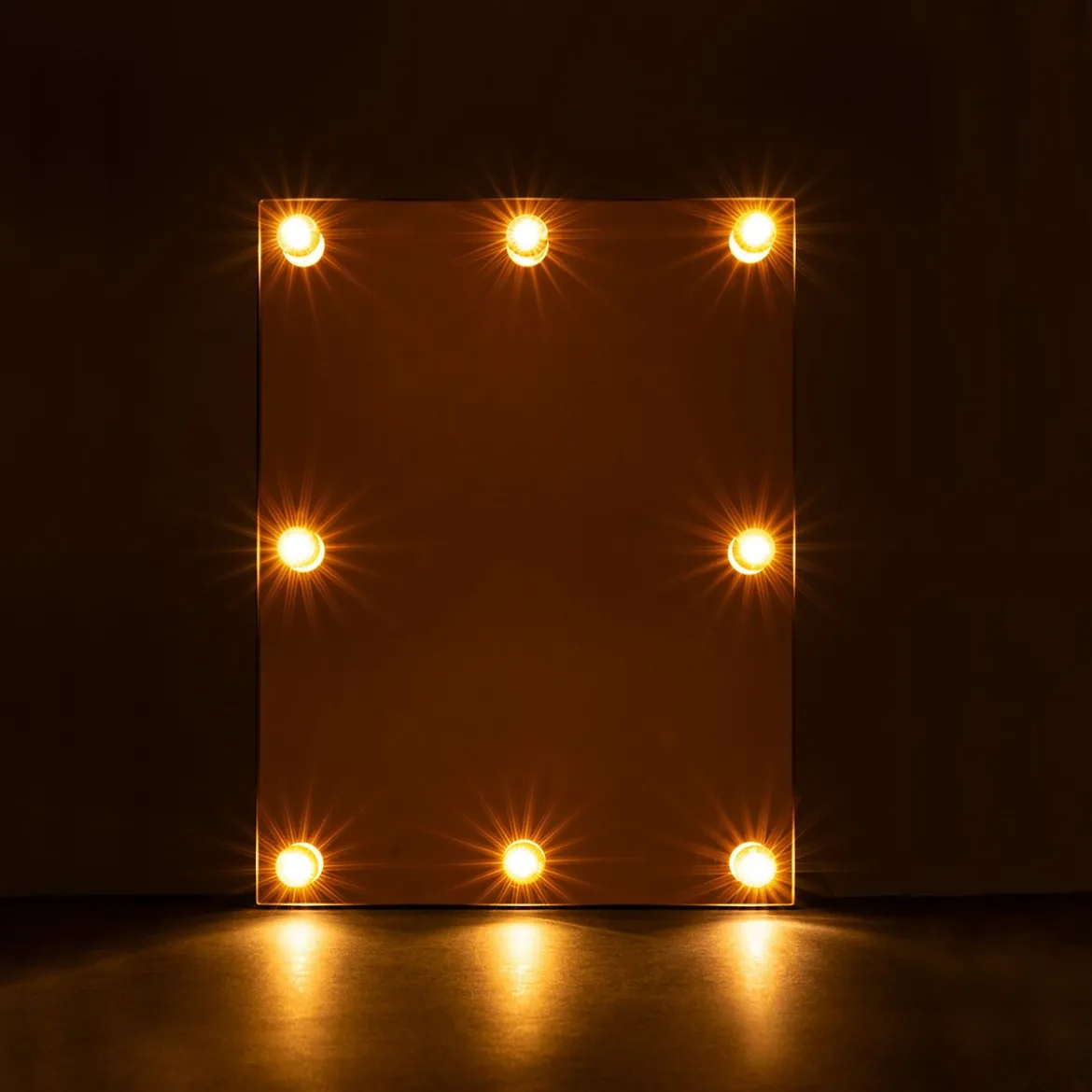 Wall-mounted illuminated mirror