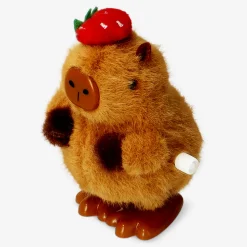 Wind up capybara with strawberry hat